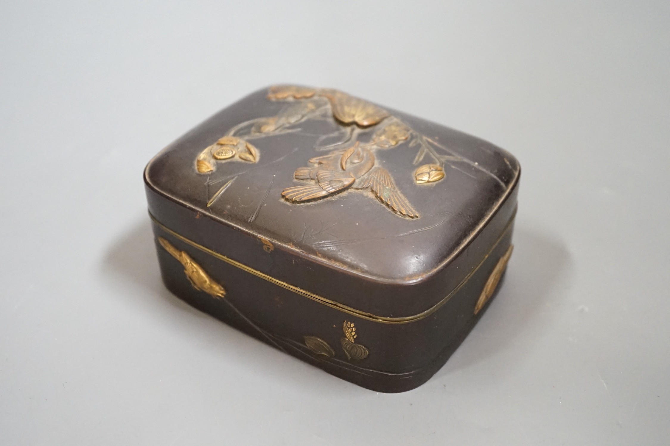 A Japanese bronze and mixed metal box, Meiji period, 12cm wide 9.5cm deep